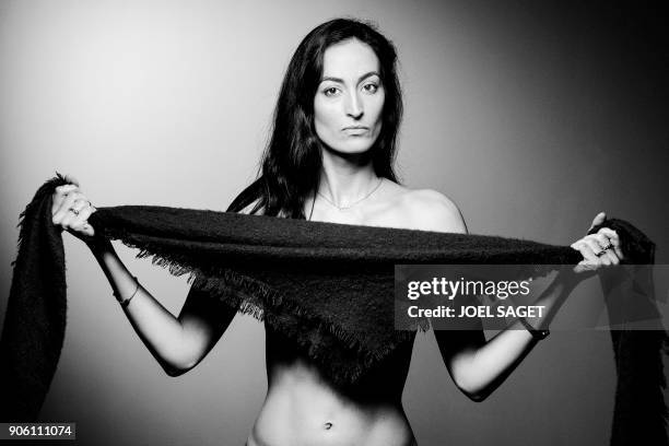 French-Lebanese actress Laetitia Eido poses during a photo session in Paris on January 8, 2018. / BLACK AND WHITE VERSION