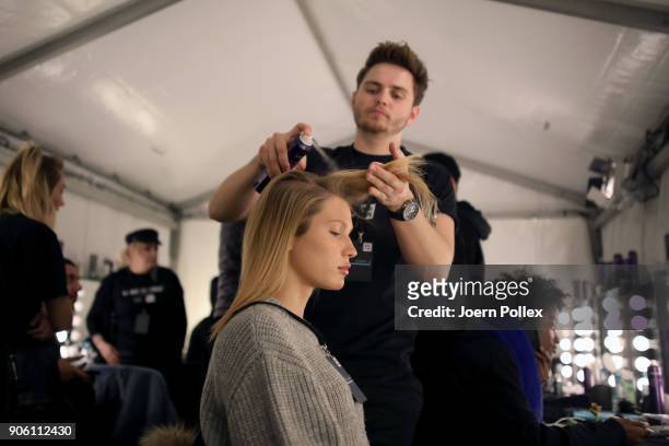 Models prepare backstage ahead of the Bogner show during the MBFW January 2018 at ewerk on January 17, 2018 in Berlin, Germany.