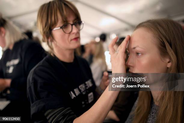 Models prepare backstage ahead of the Bogner show during the MBFW January 2018 at ewerk on January 17, 2018 in Berlin, Germany.