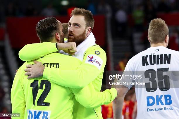 Goalkeepers Silvio Heinevetter of Germany and Andreas Wolff of Germany react after the Men's Handball European Championship Group C match between...