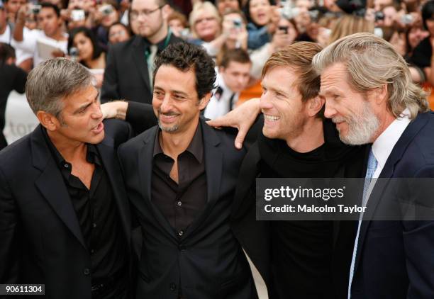 Actor George Clooney, director Grant Heslov, actors Ewan McGregor and Jeff Bridges arrive at the "The Men Who Stare At Goats" premiere during the...