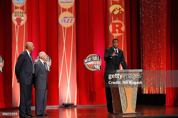 Coach Larry Brown and Hall of Fame player George Gervin present David Robinson to the Naismith Memorial Basketball Hall of Fame during an induction...