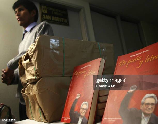 Man stands next to the books during a press conference to launch the autobiography of jailed leader of the Shining Path maoist guerrilla insurgency...