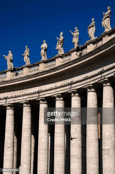 Vatican City. St. Peters Square. Colonnade of doric columns designed by Gian Lorenzo Bernini in 17th century. Baroque style.