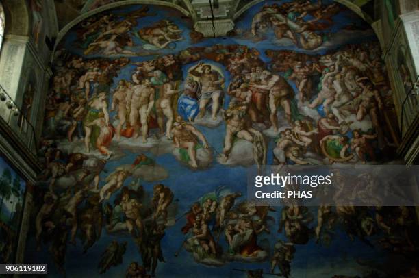 Michelangelo . Italian artist. The Last Judgement. Fresco. 1536-1541. Detail. Central part. Sistine Chapel. Vatican Museums. Vatican City.
