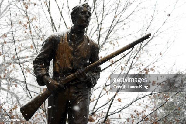 Snow falls on the Henry Lawson Wyatt Monument at the State Capitol Grounds on January 17, 2018 in Raleigh, North Carolina. Governor Roy Cooper...