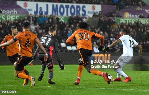 Jordan Ayew of Swansea City scores his sides first goal during The Emirates FA Cup Third Round Replay between Swansea City and Wolverhampton...