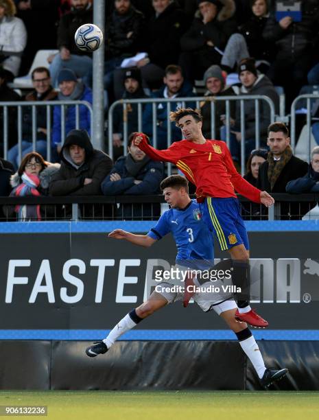 Giorgio Brogni of Italy and Roberto Gonzales of Spain compete for the ball during the U17 International Friendly match between Italy and Spain at...