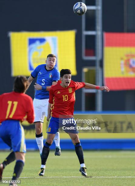 Nicolo Armini of Italy and Nabil Touazi of Spain compete for the ball during the U17 International Friendly match between Italy and Spain at Juventus...