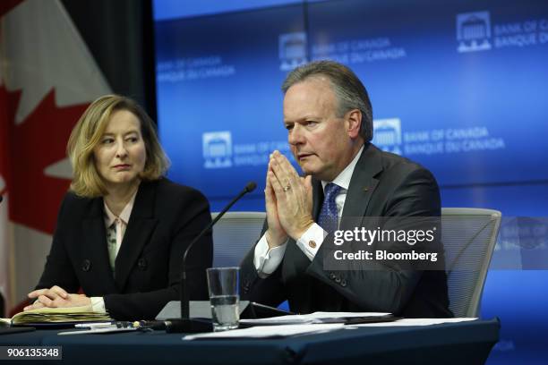 Stephen Poloz, governor of the Bank of Canada, right, speaks as Carolyn Wilkins, senior deputy governor at the Bank of Canada, listens during a press...