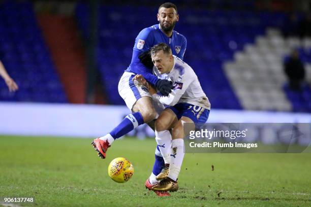 George Thomas of Leicester City in action with Craig Davies of Oldham Athletic during the Checkatrade Trophy tie between Oldham Athletic and...