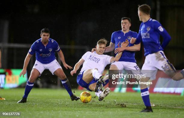 Sam Hughes of Leicester City in action with George Edmundson of Oldham Athletic during the Checkatrade Trophy tie between Oldham Athletic and...