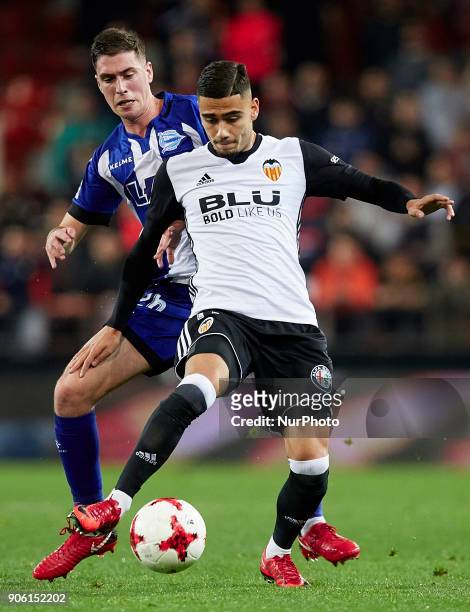 Andreas Pereira of Valencia CF competes for the ball with Dieguez of Deportivo Alaves during the Copa del Rey quarter-final first leg game between...