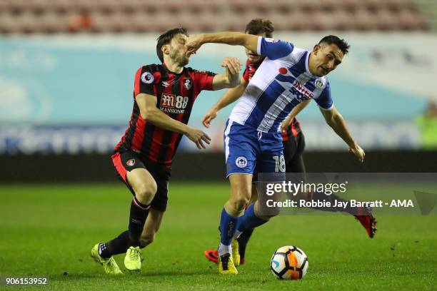 Harry Arter of Bournemouth and Gary Roberts of Wigan Athletic during The Emirates FA Cup Third Round Replay between Wigan Athletic v AFC Bournemouth...