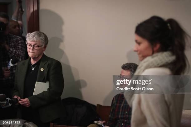 Michigan State University President Lou Anna Simon answers a question after being confronted by former MSU gymnast Lidsey Lemke during a break in the...