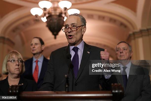 Senate Minority Leader Sen. Chuck Schumer speaks to members of the media as Senate Minority Whip Sen. Dick Durbin , Sen. Patty Murray , and Sen. Ron...