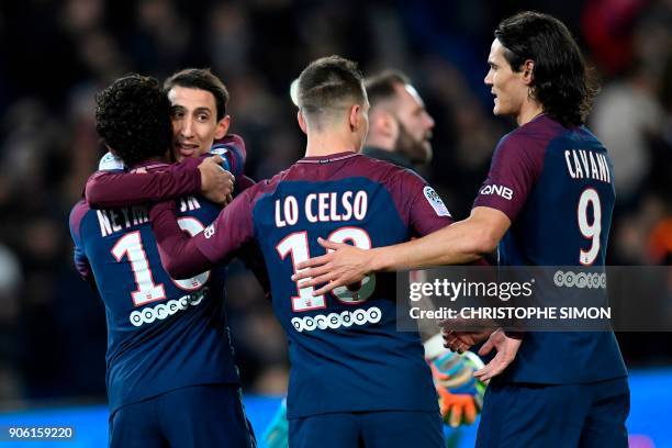 Paris Saint-Germain's Argentinian forward Angel Di Maria celebrates with Paris Saint-Germain's Brazilian forward Neymar and Paris Saint-Germain's...