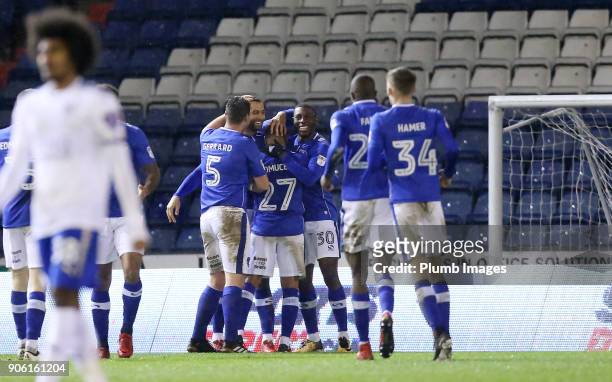 Craig Davies of Oldham Athletic celebrates with his team mates after scoring to make it 1-1 during the Checkatrade Trophy tie between Oldham Athletic...