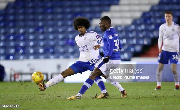 Hamza Choudhury of Leicester City in action with Tope Obadeyi of Oldham Athletic during the Checkatrade Trophy tie between Oldham Athletic and...