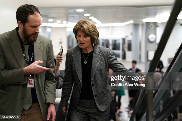 Sen. Lisa Murkowski speaks to members of the media at the basement of the U.S. Capitol prior to a Senate Republican Policy Luncheon January 17, 2018...