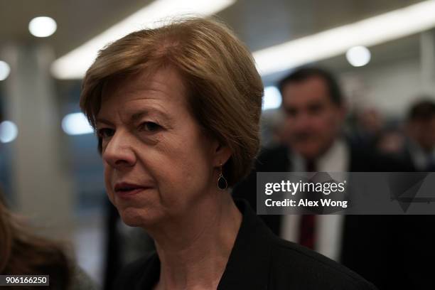 Sen. Tammy Baldwin passes through the basement of the U.S. Capitol prior to a Senate Democratic Policy Luncheon January 17, 2018 in Washington, DC....