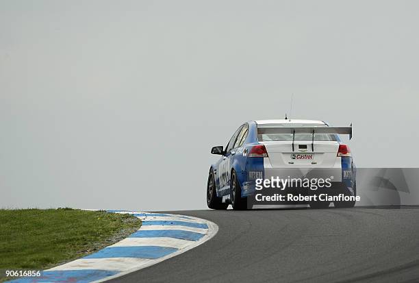 Troy Bayliss drives the Triple F Racing Holden during practice for round nine of the V8 Supercar Championship Series at the Phillip Island Grand Prix...