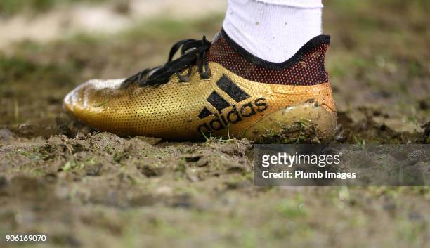 Muddy boot during the Checkatrade Trophy tie between Oldham Athletic and Leicester City at Boundary Park on January 17, 2018 in Oldham, United...