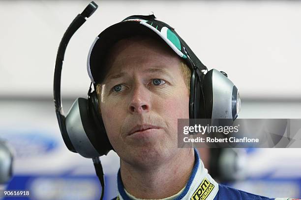 Steven Richards driver of the Ford Performance Racing Ford looks on during practice for round nine of the V8 Supercar Championship Series at the...