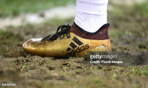 Muddy boot during the Checkatrade Trophy tie between Oldham Athletic and Leicester City at Boundary Park on January 17, 2018 in Oldham, United...