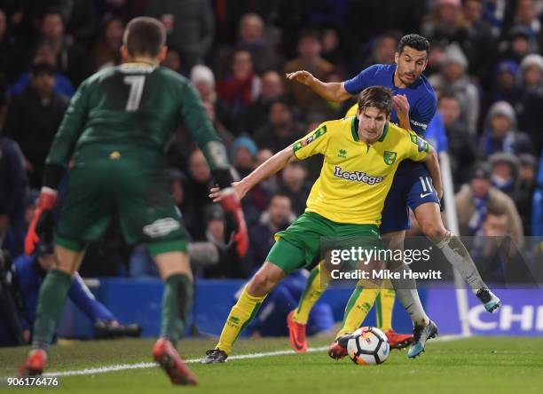 Timm Klose of Norwich City and Pedro of Chelsea in action during The Emirates FA Cup Third Round Replay between Chelsea and Norwich City at Stamford...