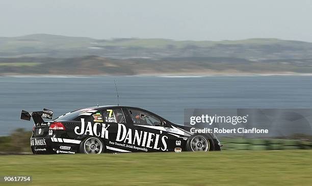 Todd Kelly driving the Kelly Racing Holden leads during race A for round nine of the V8 Supercar Championship Series at the Phillip Island Grand Prix...