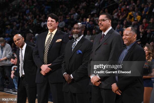 Danny Schayes Calvin Natt Wayne Cooper and Mike Evans look on during a half time presentation during the game between the Memphis Grizzlies and...