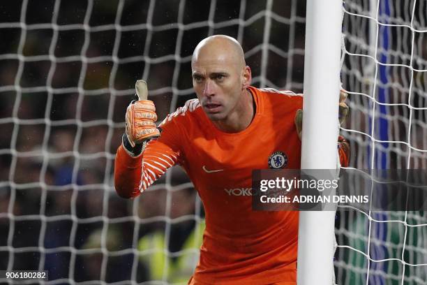 Chelsea's Argentinian goalkeeper Willy Caballero gestures during the FA Cup third round replay football match between Chelsea and Norwich City at...