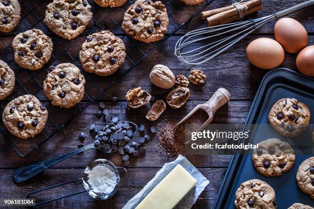 preparing homemade chocolate chip cookies - baking overhead stock pictures, royalty-free photos & images