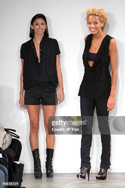 Designers Michelle Ochs and Carly Chushnie walk the runway at the end of their Cushnie Et Ochs fashion show during Mercedes-Benz Fashion Week Spring...