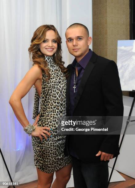 Actress Mena Suvari and Producer Simone Sestito poses at Nigel Barker's "A Sealed Fate" Celebrities Supporting HSUS' Protect Seals Campaign held at...