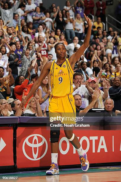 Lisa Leslie of the Los Angeles Sparks waves to the fans after exiting the game against the Minnesota Lynx on September 11, 2009 at Staples Center in...