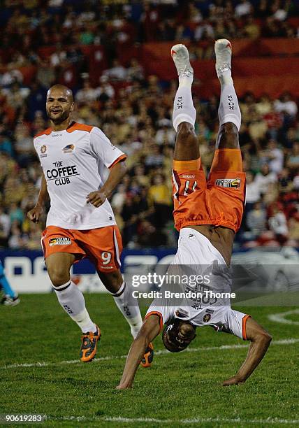 Reinaldo of the Roar celebrates with a back flip after scoring against the Jets during the round six A-League match between the Newcastle Jets and...