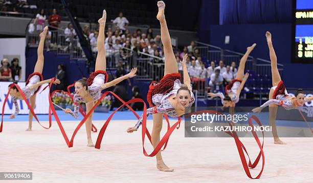 Spain's rhythmic gymnasts, Loreto Achaerandid, Sandra Agular, Sara Garvin, Ana Maria Pelaz, Alejandra Quereda, and Lidia Redondo, perform with...