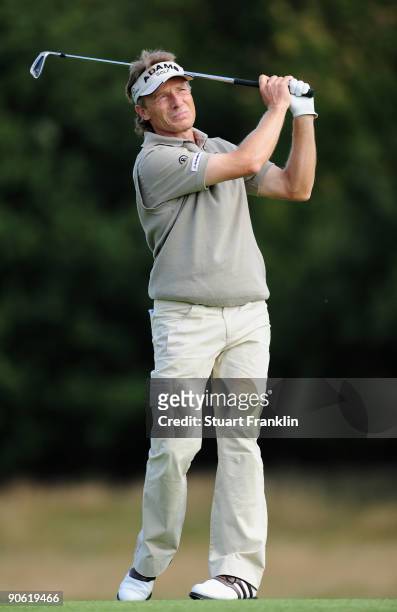 Bernhard Langer of Germany plays his approach shot on the sixth hole during the third round of The Mercedes-Benz Championship at The Gut Larchenhof...
