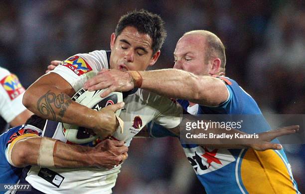 Corey Parker of the Broncos takes on the defence during the second NRL qualifying final match between the Gold Coast Titans and the Brisbane Broncos...