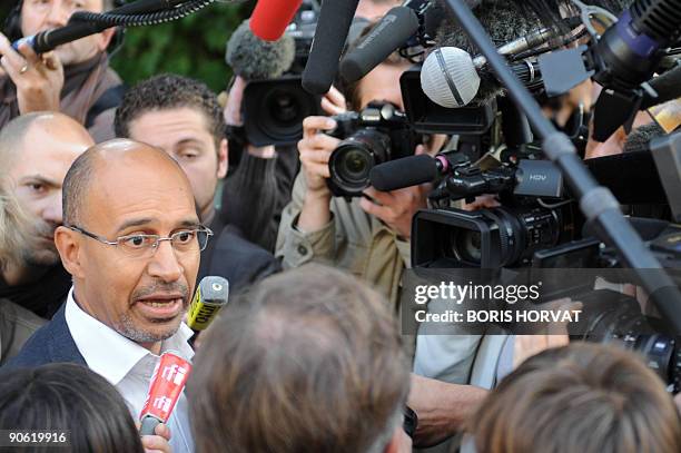 Socialist Party European MP and national secretary in charge of the coordination Harlem Desir speaks to the press as he arrives at the Socialist...