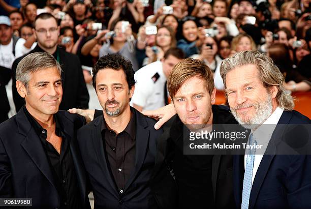 Actor George Clooney, director Grant Heslov, actors Ewan McGregor and Jeff Bridges arrive at the "The Men Who Stare At Goats" premiere during the...