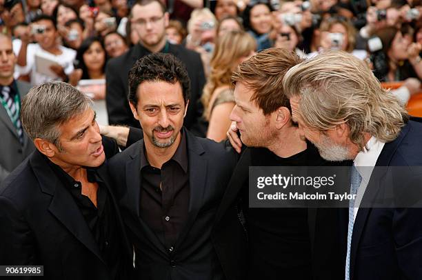 Actor George Clooney, director Grant Heslov, actors Ewan McGregor and Jeff Bridges arrive at the "The Men Who Stare At Goats" premiere during the...