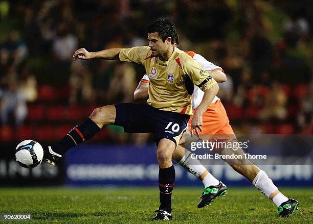 Donny De Groot of the Jets competes with Josh McCloughan of the Roar during the round six A-League match between the Newcastle Jets and the Brisbane...