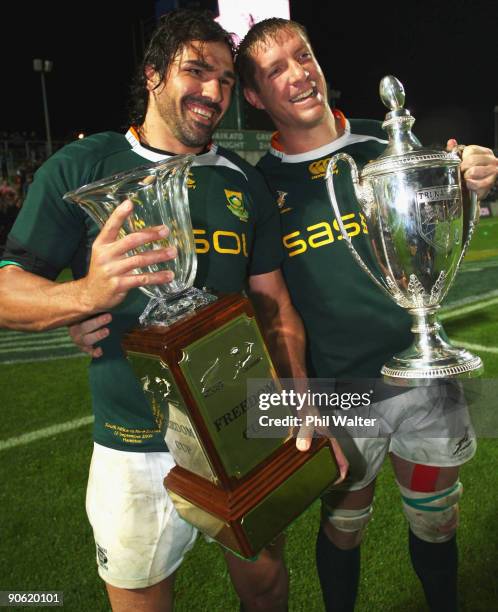 Victor Matfield and Bakkies Botha of South Africa celebrate with the Tri Nations and Freedom Cups following the Tri Nations Test between the New...