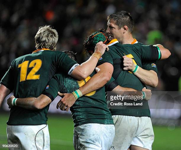 Bakkies Botha of the Springboks celebrates with team mates following his teams win in the Tri Nations Test between the New Zealand All Blacks and...