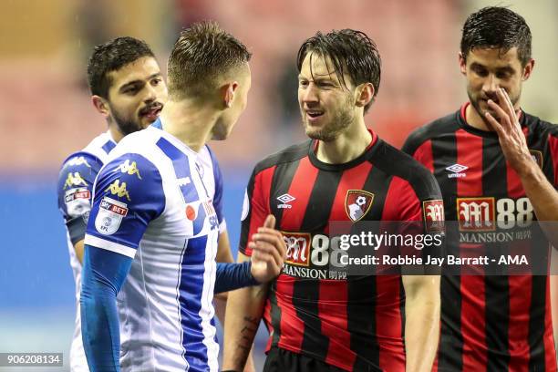 Max Power of Wigan Athletic and Harry Arter of Bournemouth have a disagreement during The Emirates FA Cup Third Round Replay between Wigan Athletic v...