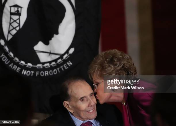 Former U.S. Senator Elizabeth Dole kisses her husband, former Senate Majority Leader Bob Dole , after he received the Congressional Medal during an...
