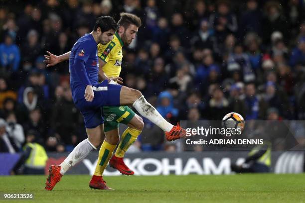 Chelsea's Spanish striker Alvaro Morata vies with Norwich City's Portuguese defender Ivo Pinto to take a shot at goal during the FA Cup third round...